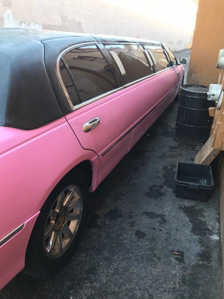 Pink 1998 Lincoln Town Car Stretched Limousine